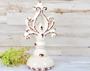 Worn white decorative ceramic finial pedestal
